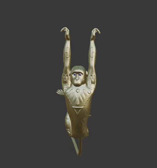 Huk's macaque in gold, arms raised and tail hanging, in Blender.