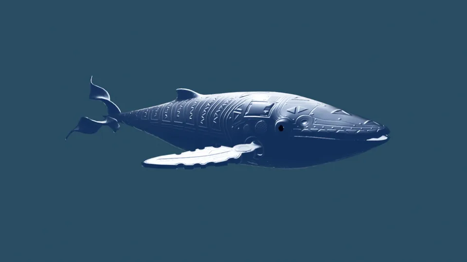 Yakumama, a silver whale with a carved, patterned skin, floats on a blue ground.